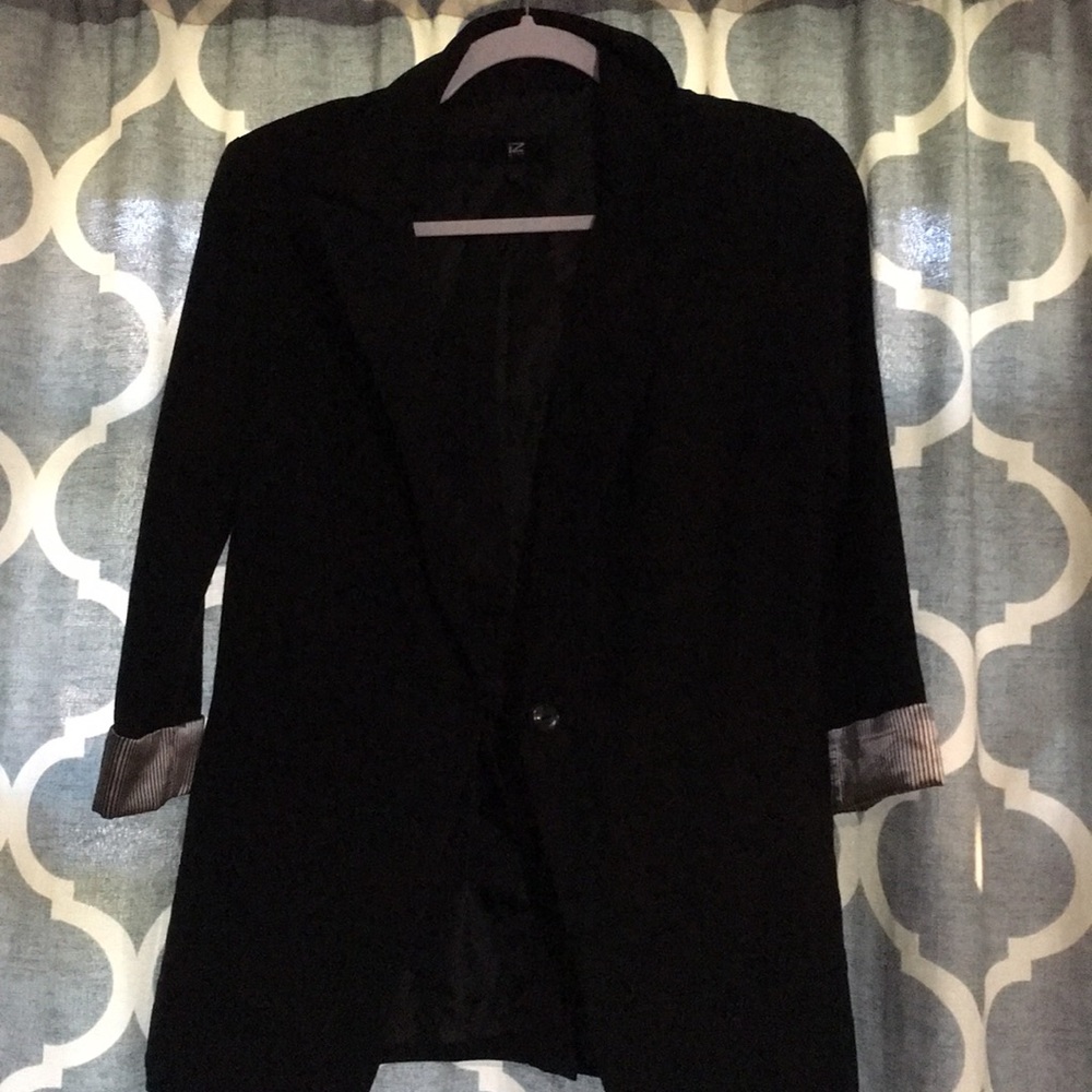 Black dresses jacket with stripes on the arms